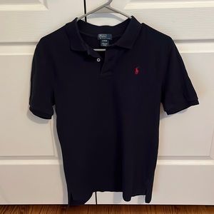Dark blue short sleeve polo shirt. Slightly used no signs of wear. Large.